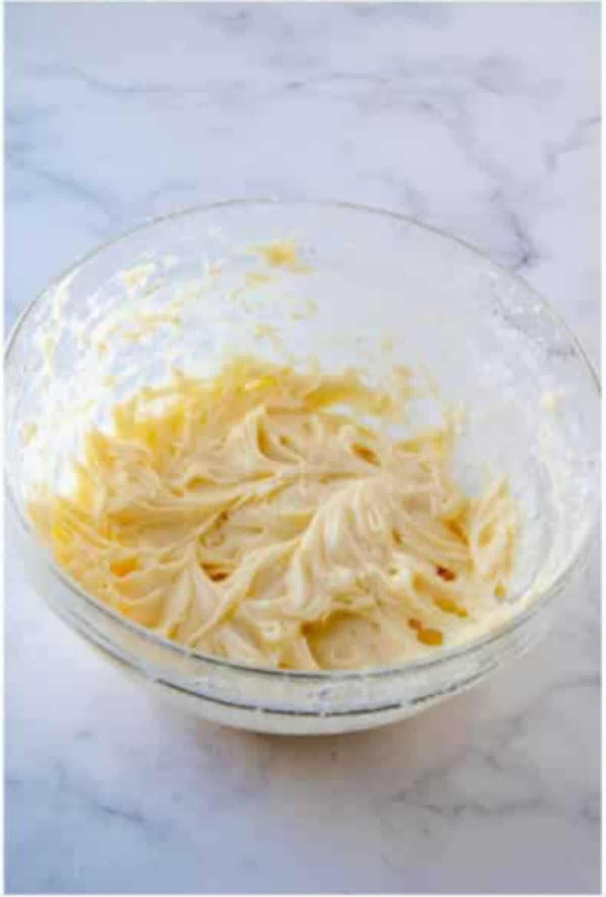 White chocolate and coconut added to the strawberry cheesecake mixture.