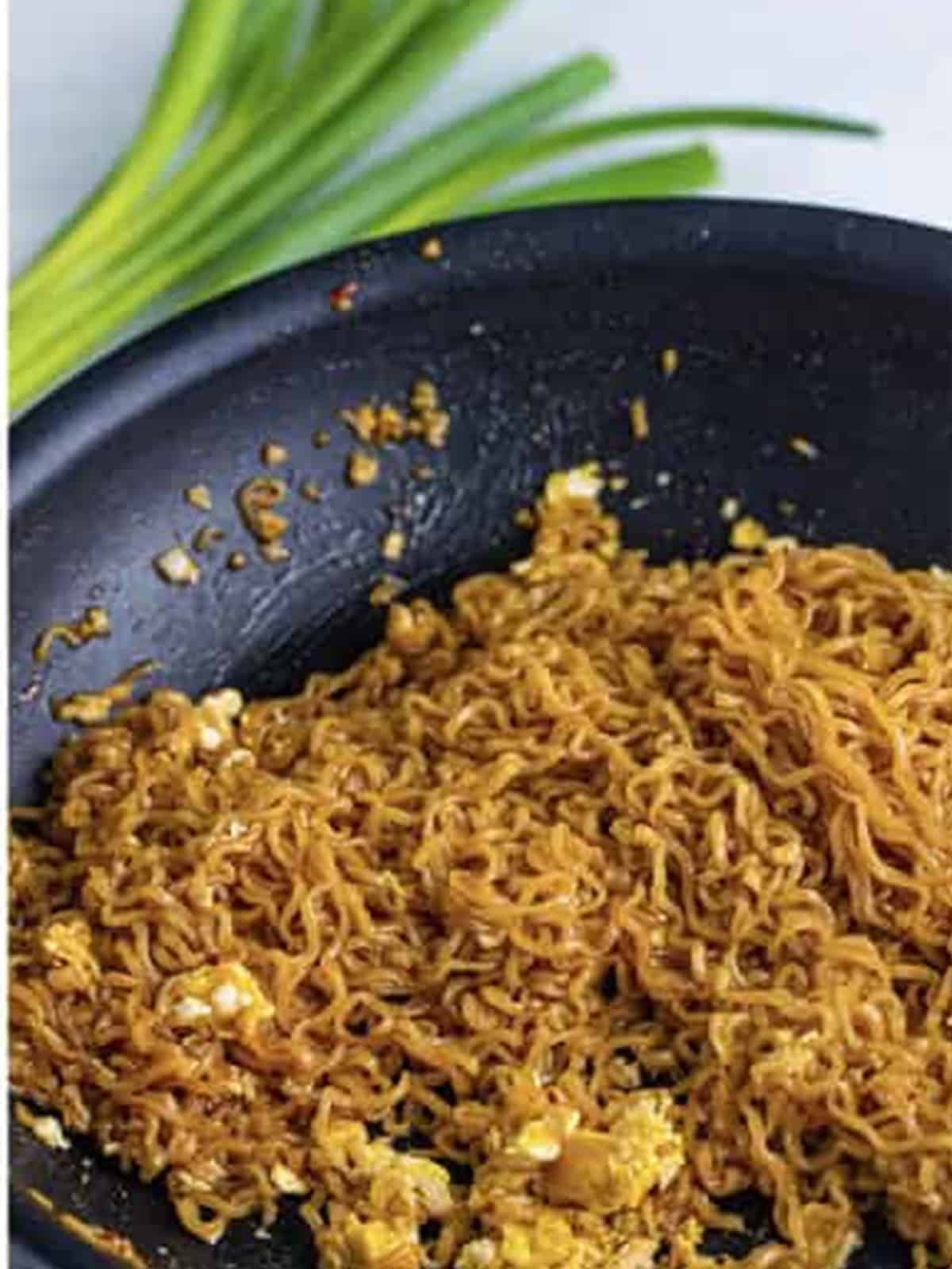 Finished TikTok ramen noodles tossed with scrambled egg in the pan.