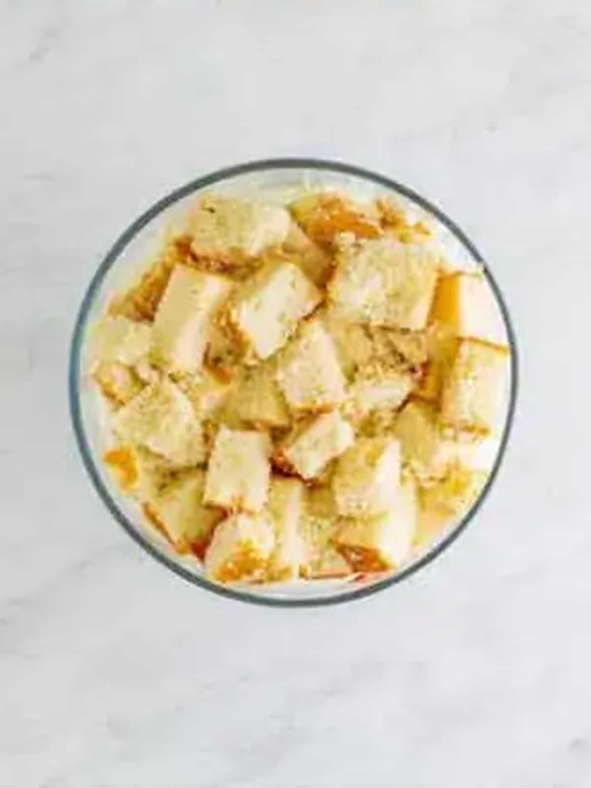 Cake cubes layered in the bottom of a trifle bowl for a 4th of July Trifle.