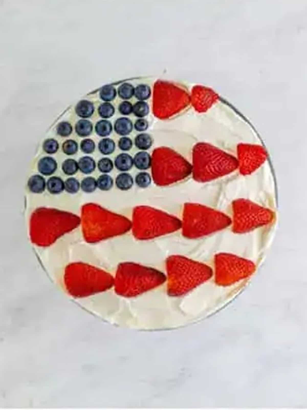 A 4th of July Trifle topped with a blueberry and strawberry flag design.