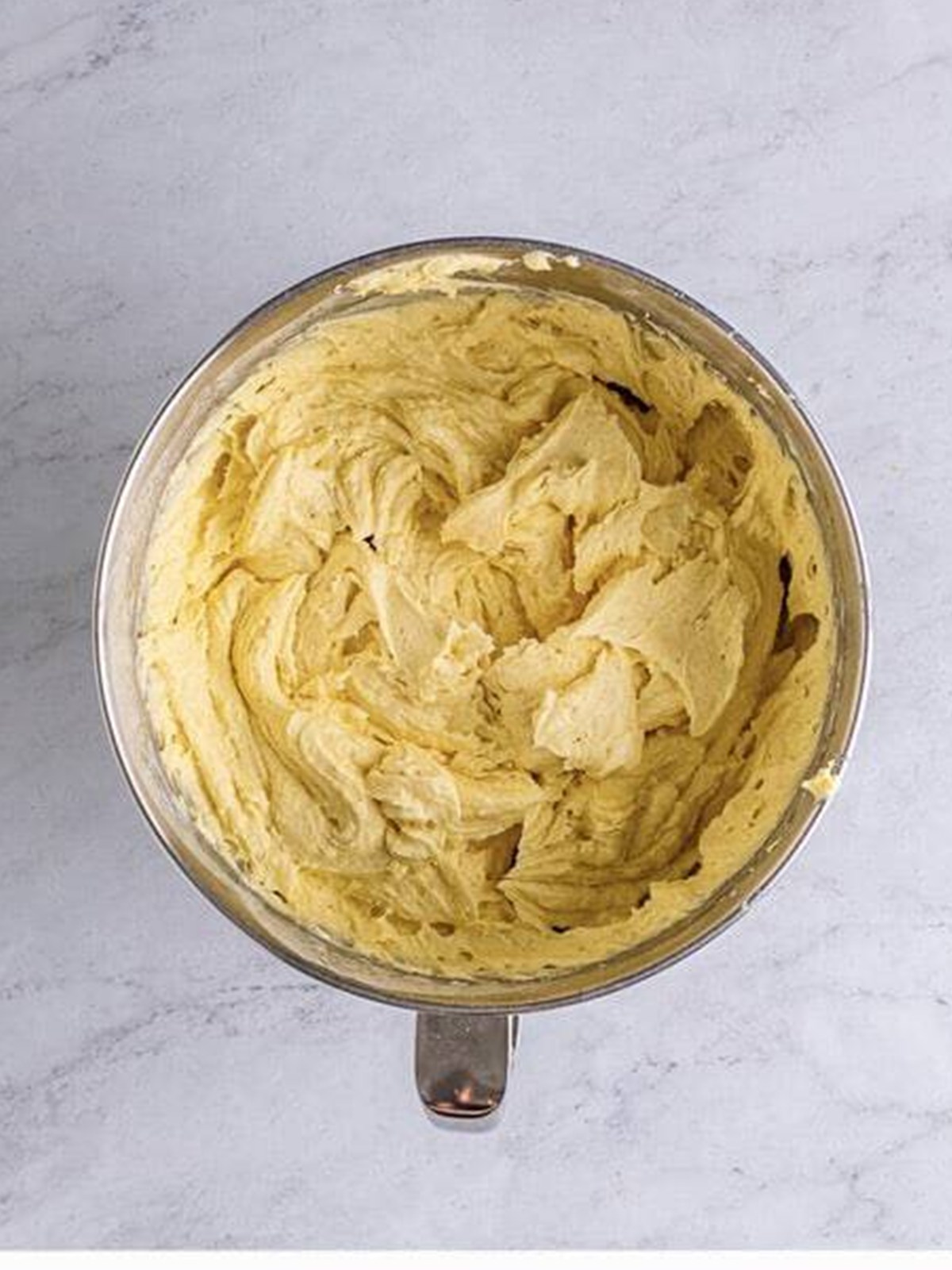 Smooth pound cake batter mixed in the bowl.