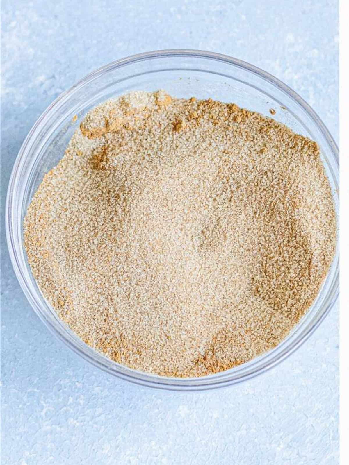 Brown sugar and cinnamon filling mixed together in a small bowl.