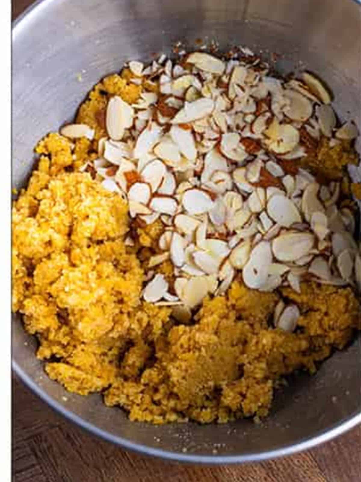Sliced almonds stirred into the almond cookie dough.