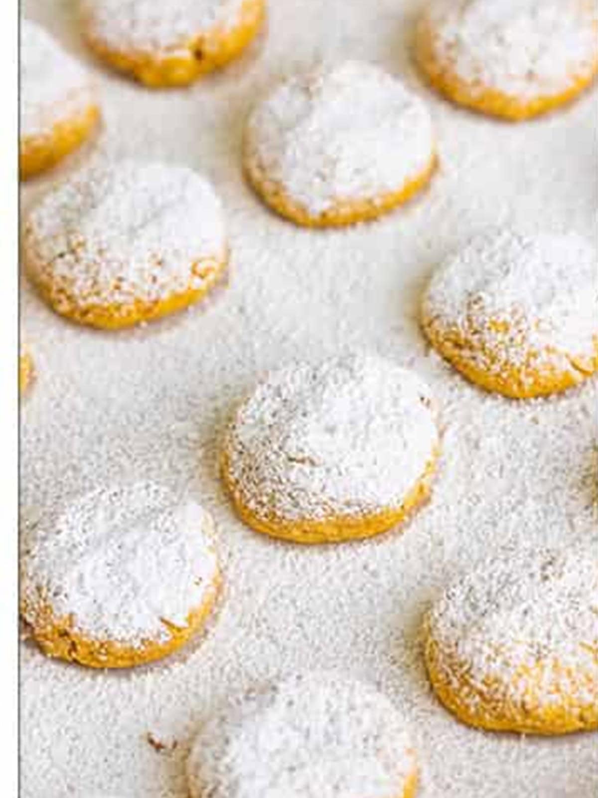 Almond flour cookies dusted with powdered sugar.