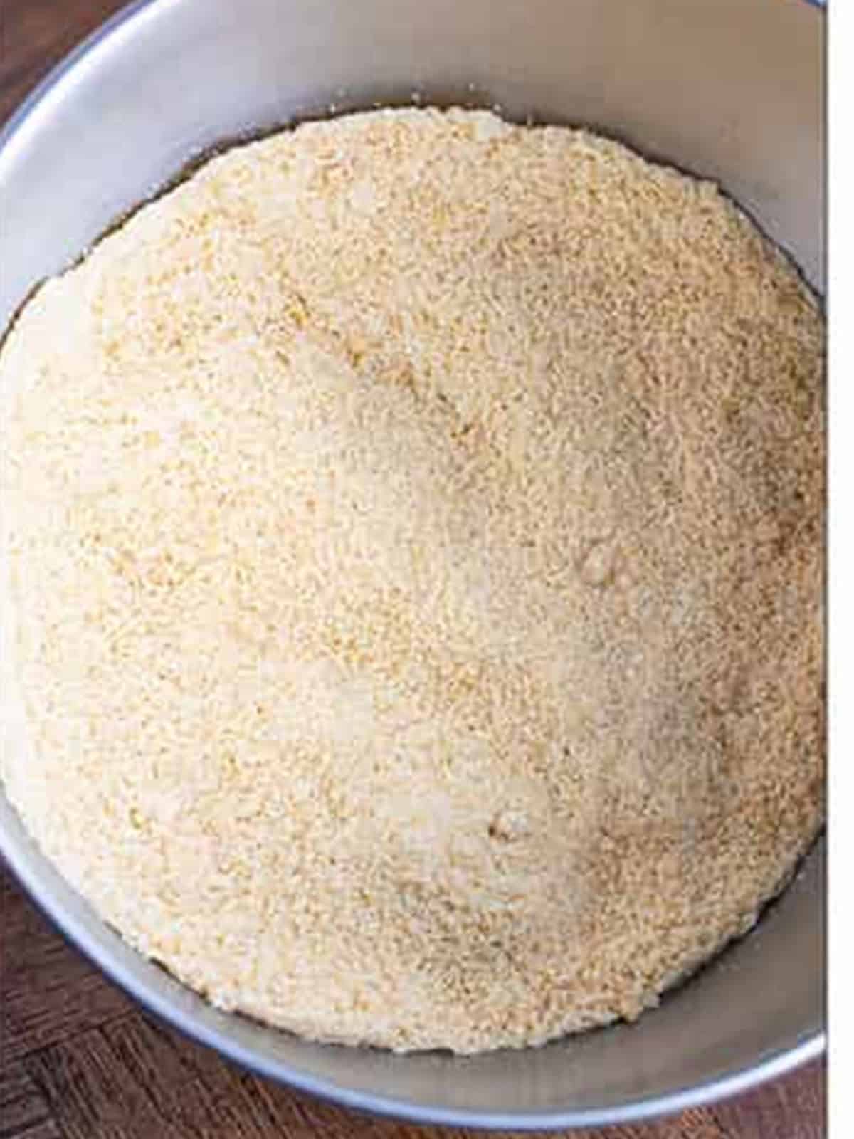Almond flour and brown sugar combined in a mixing bowl.