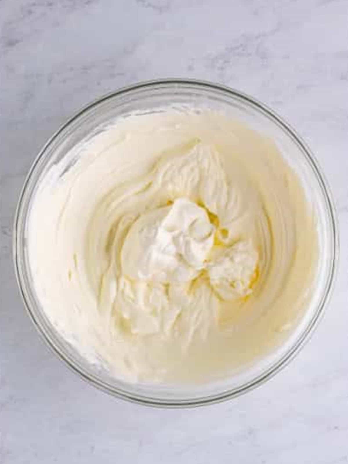 Sour cream folded into the whipped cream for ambrosia salad.