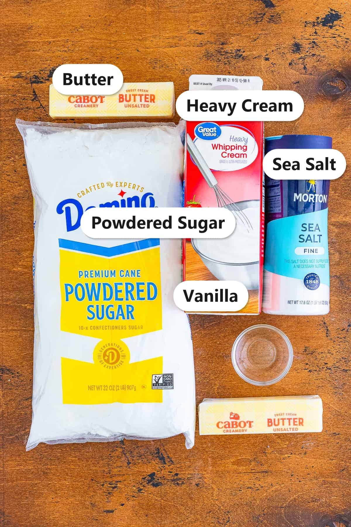 American buttercream frosting ingredients labeled on a wood board