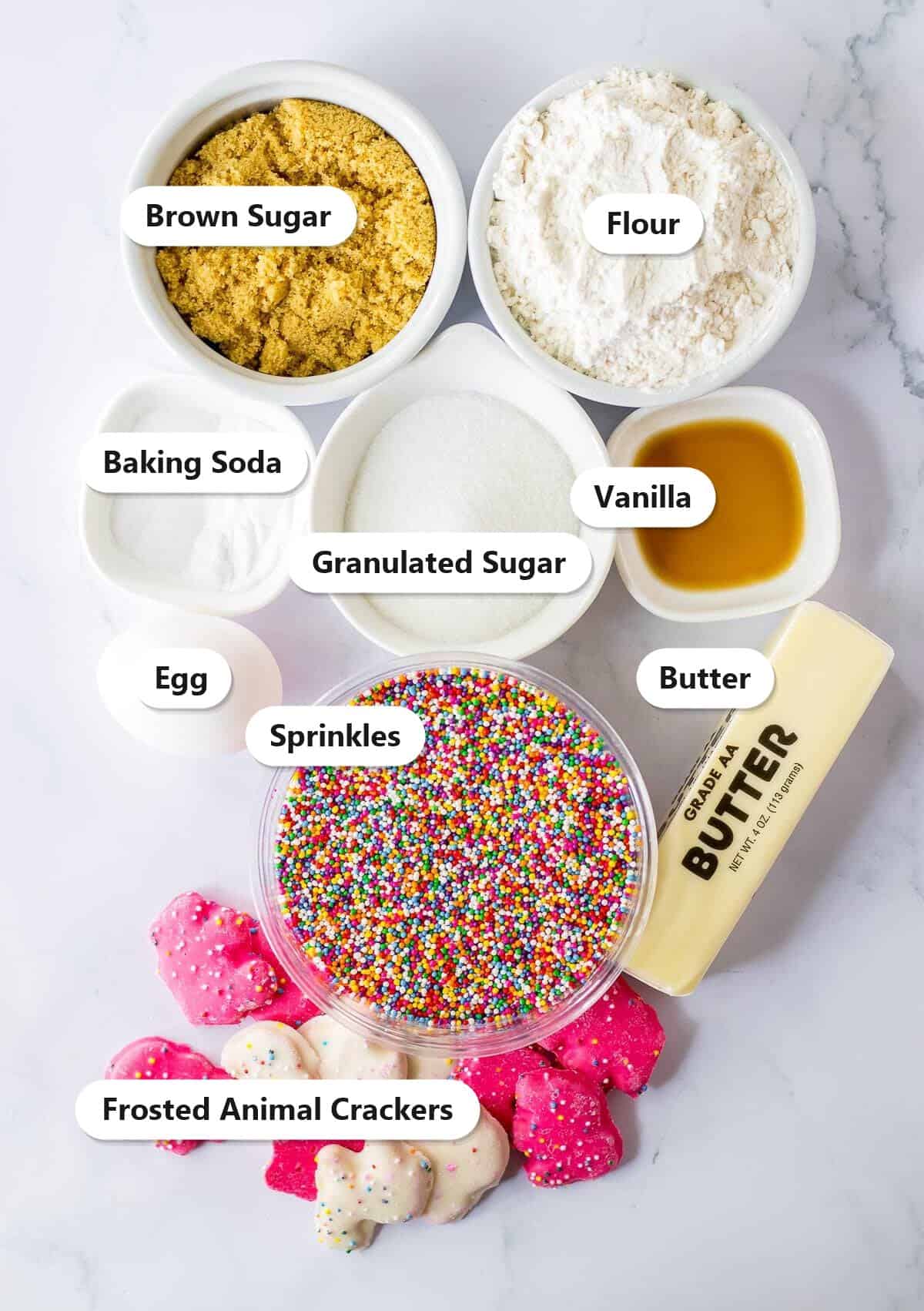Labeled animal cracker cookie ingredients including butter, sugars, sprinkles, and frosted animal crackers.