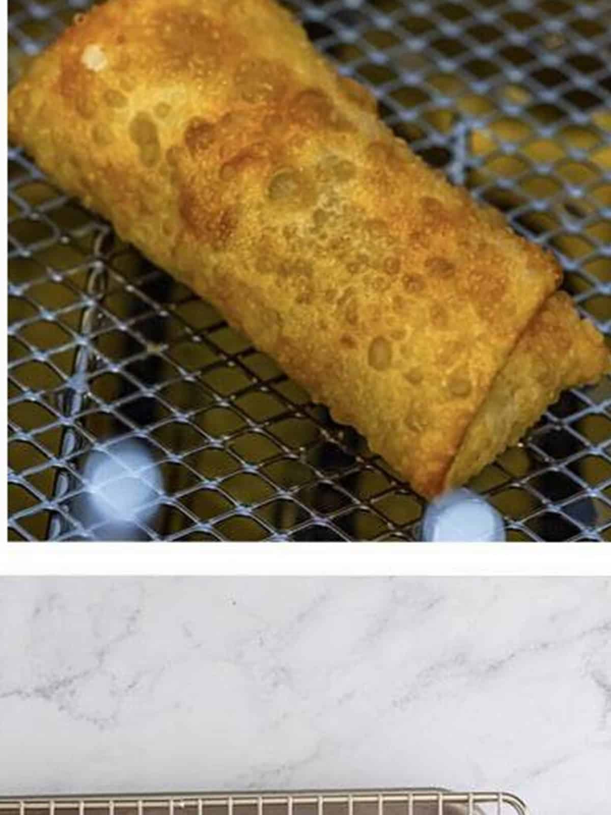 A golden fried apple pie egg roll draining on a wire rack.