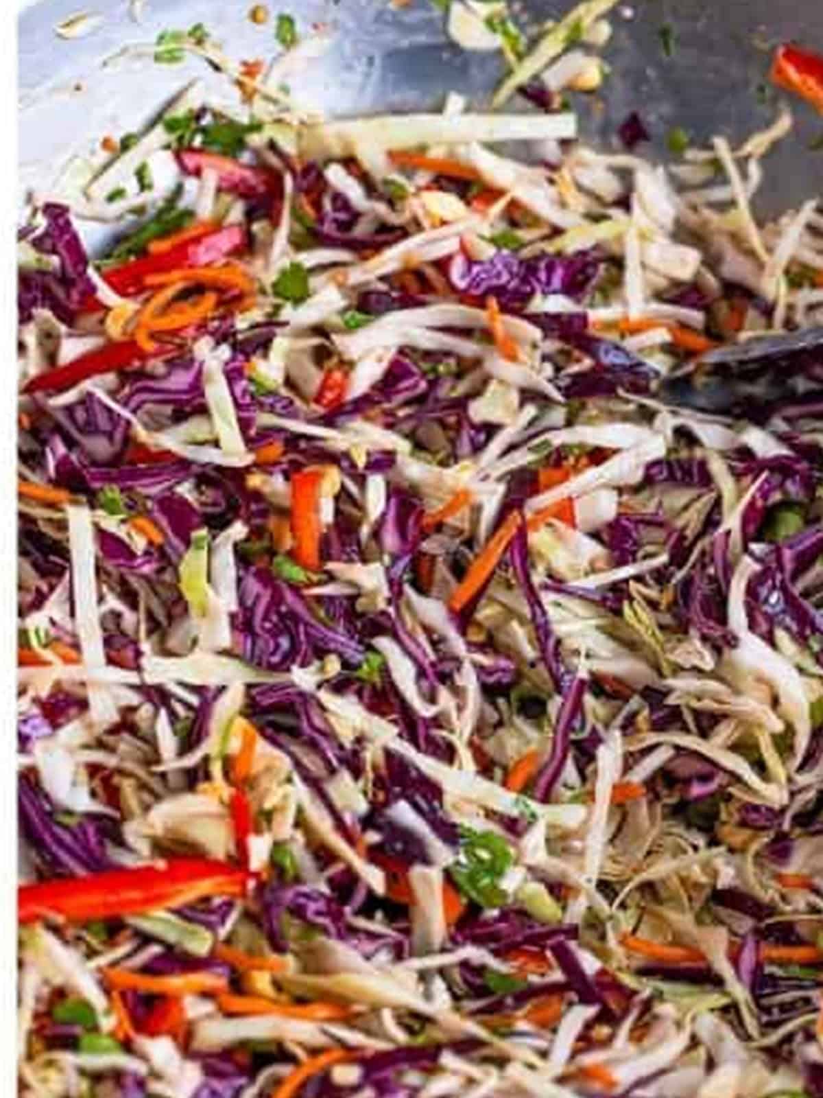 Finished Asian slaw tossed in the sweet and savory dressing.