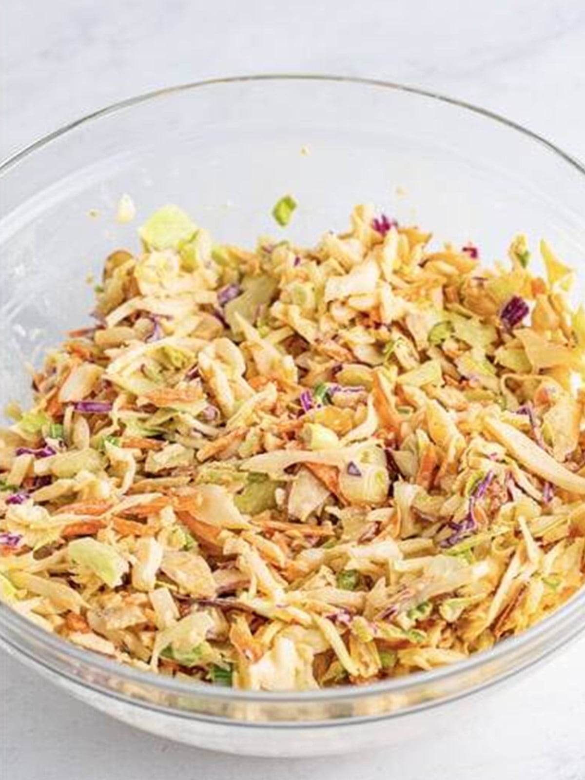 Finished crunchy Asian slaw garnished and ready to serve.