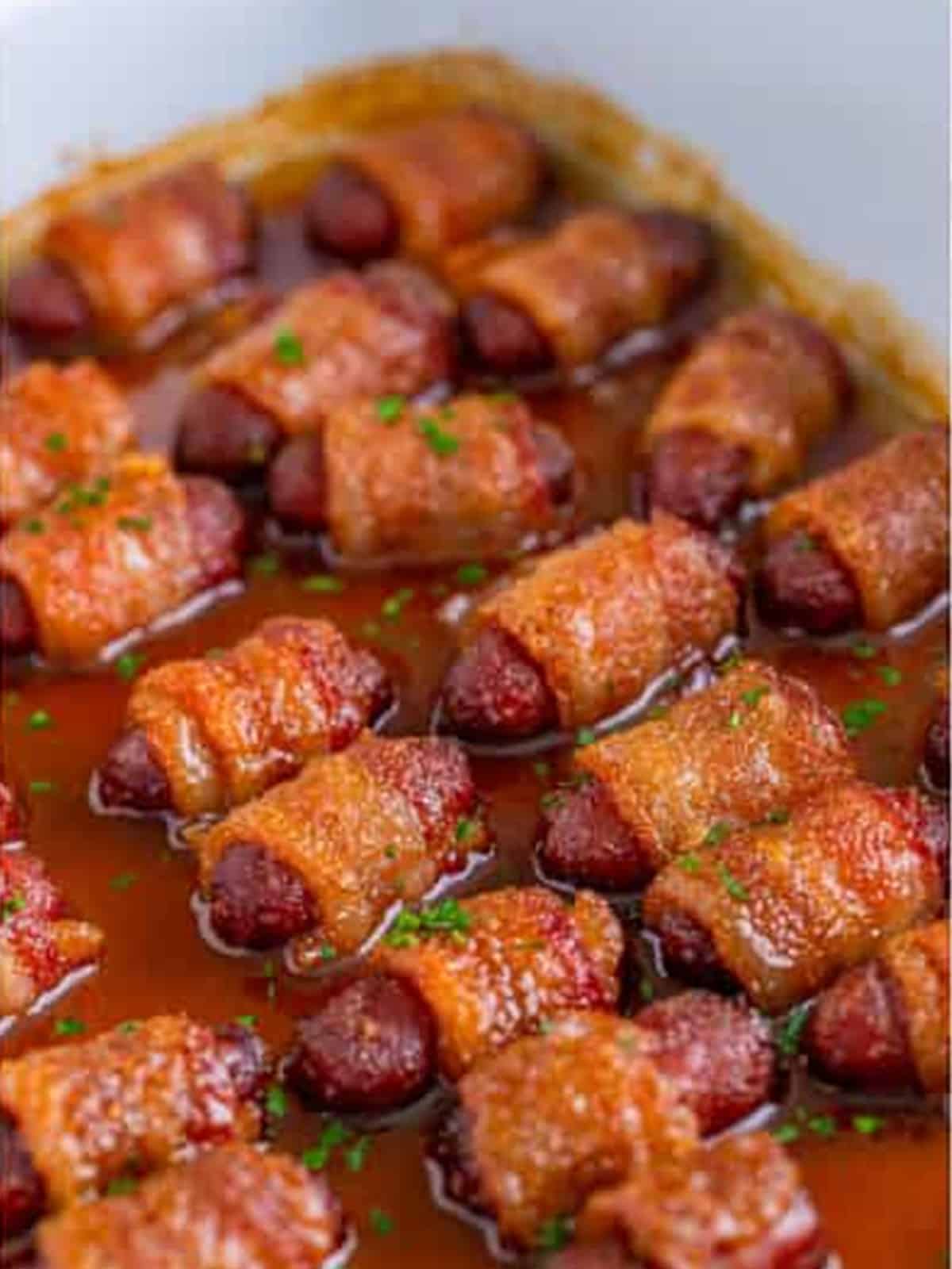 Golden caramelized Bacon Wrapped Little Smokies fresh from the oven.