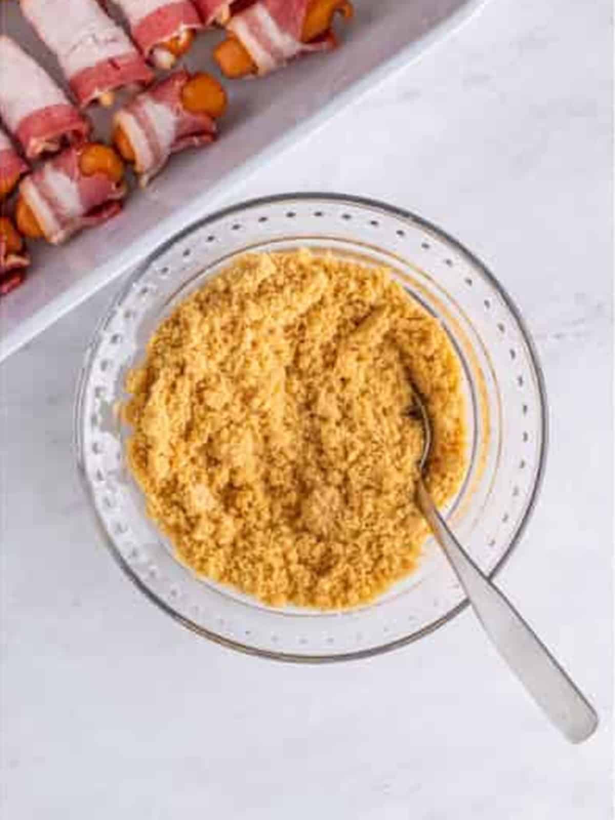 Stirring the brown sugar seasoning mixture together.