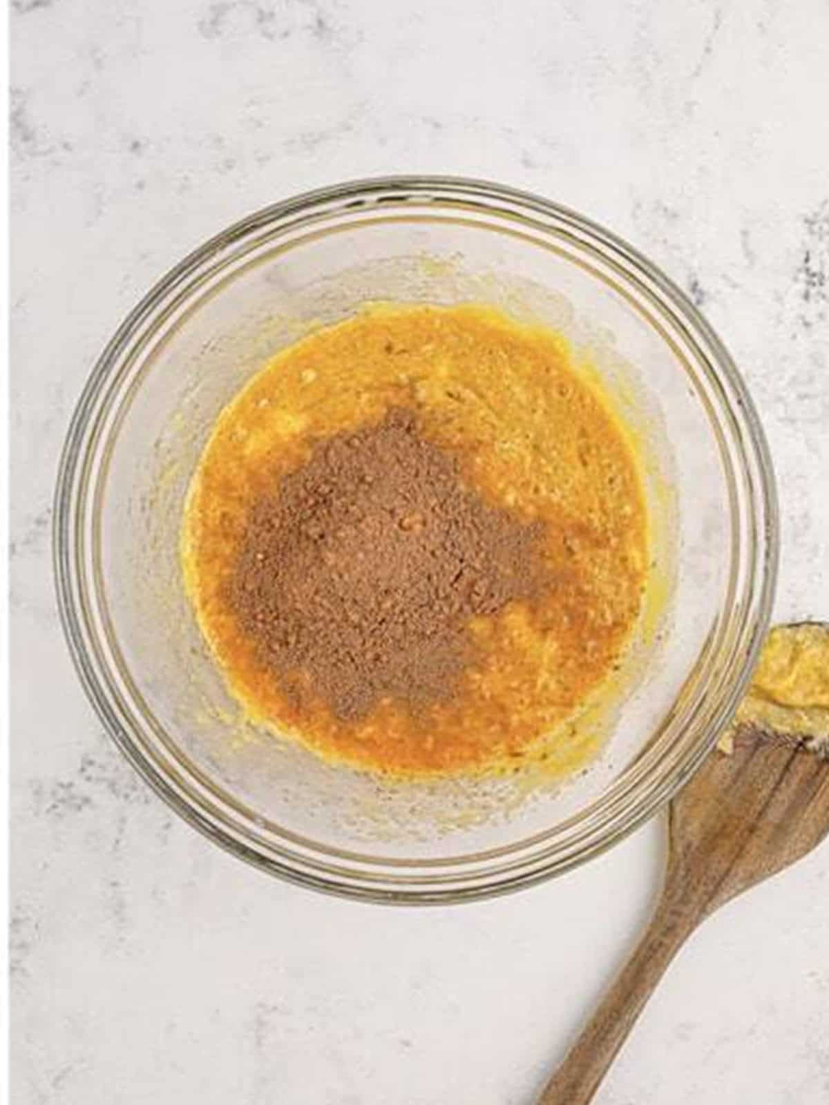 Cocoa powder mixed into the butter and sugar to make a chocolate donut batter.
