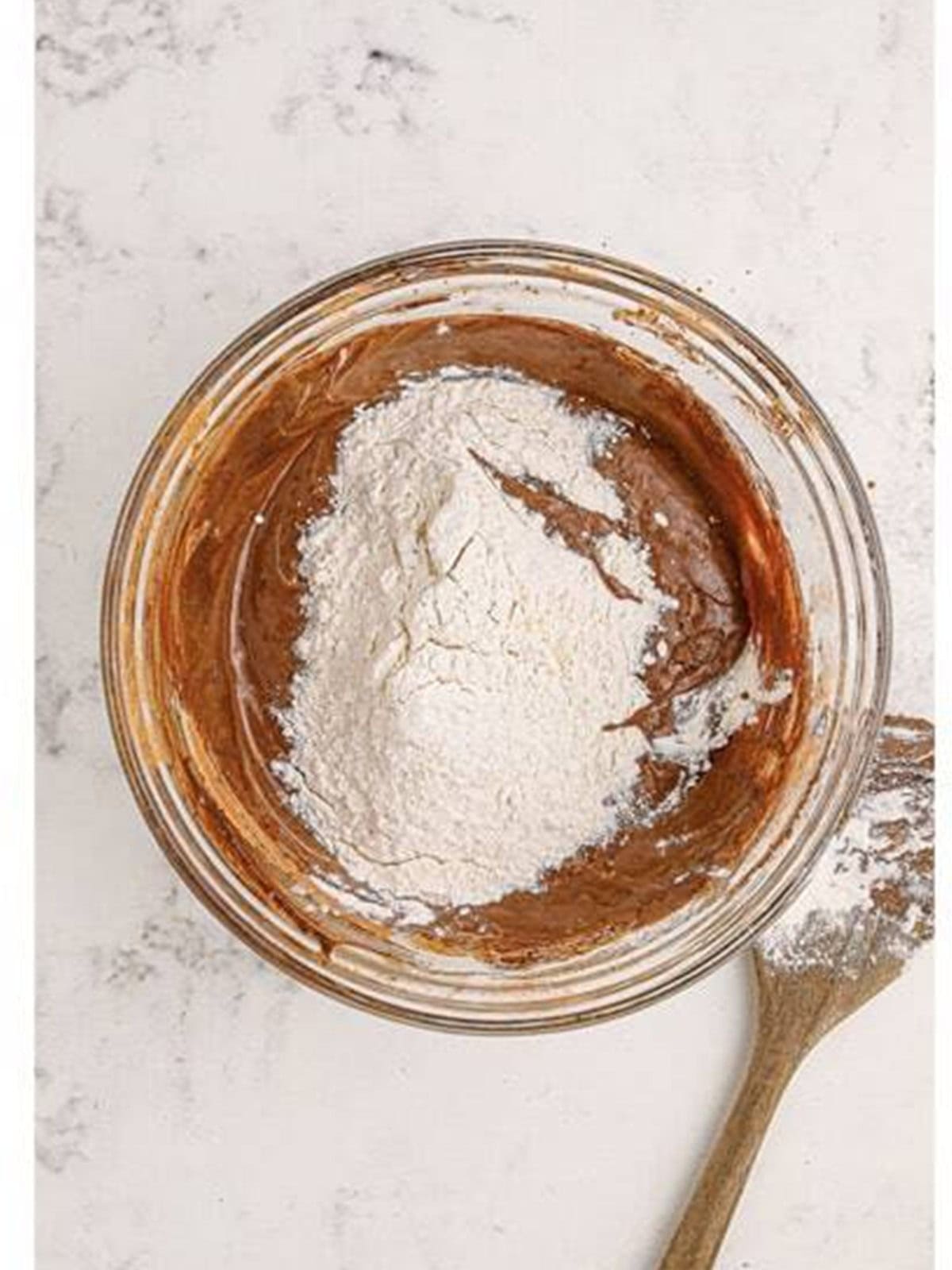 Flour and buttermilk stirred into the chocolate donut batter.