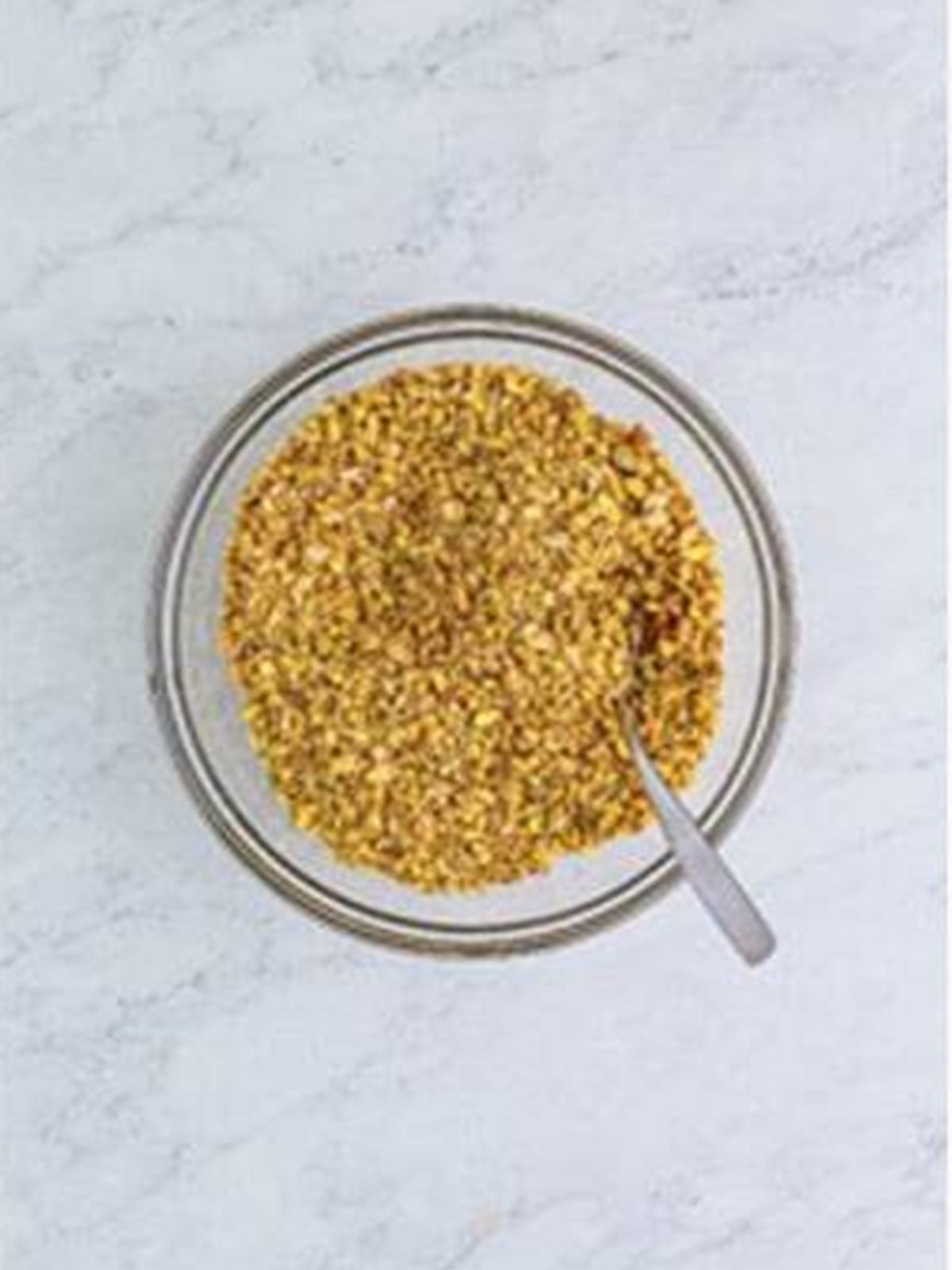 Finely chopped nuts mixed with cinnamon in a glass bowl for baklava