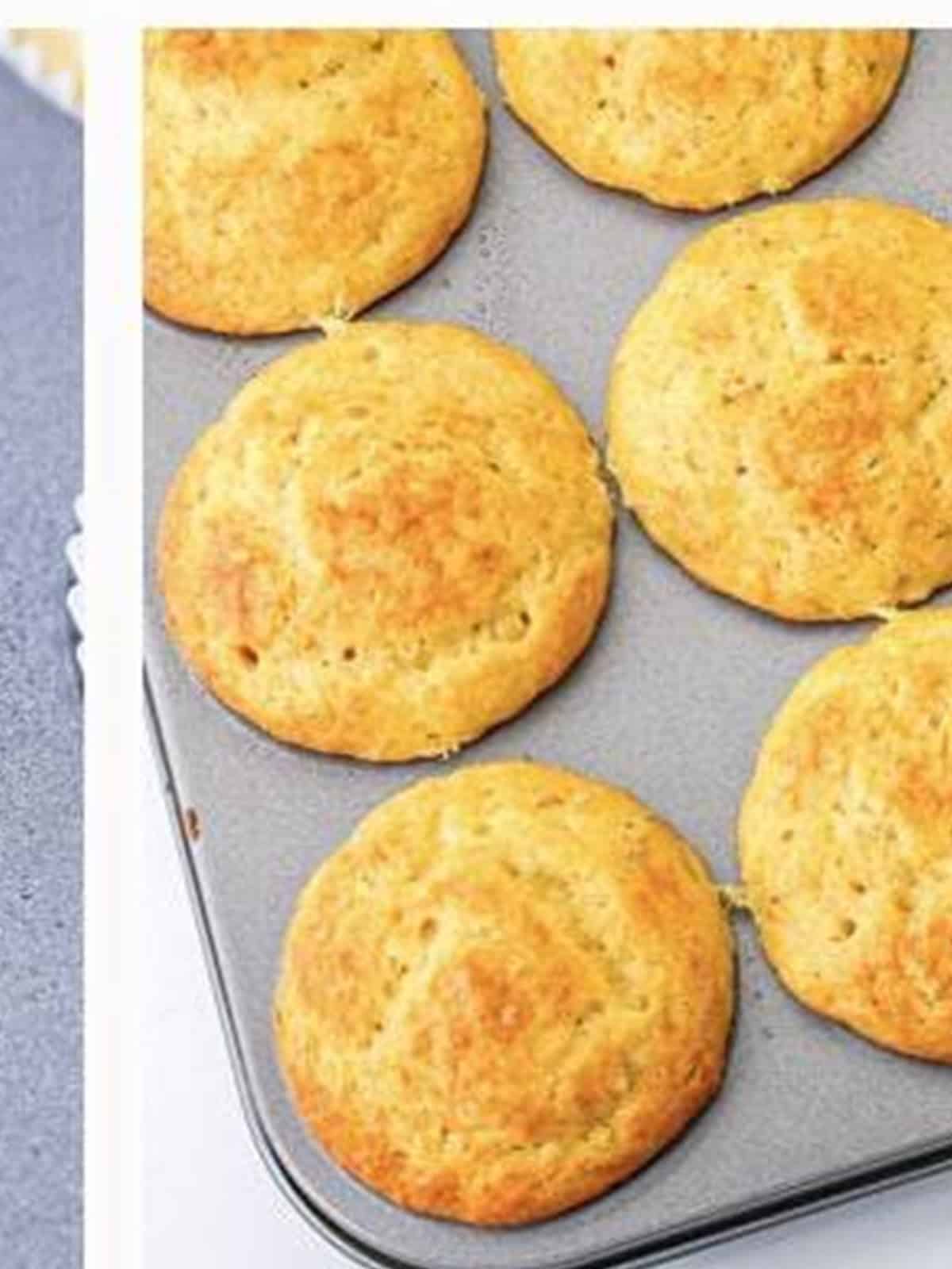 Golden baked Banana Cake Mix Muffins in a muffin tin.