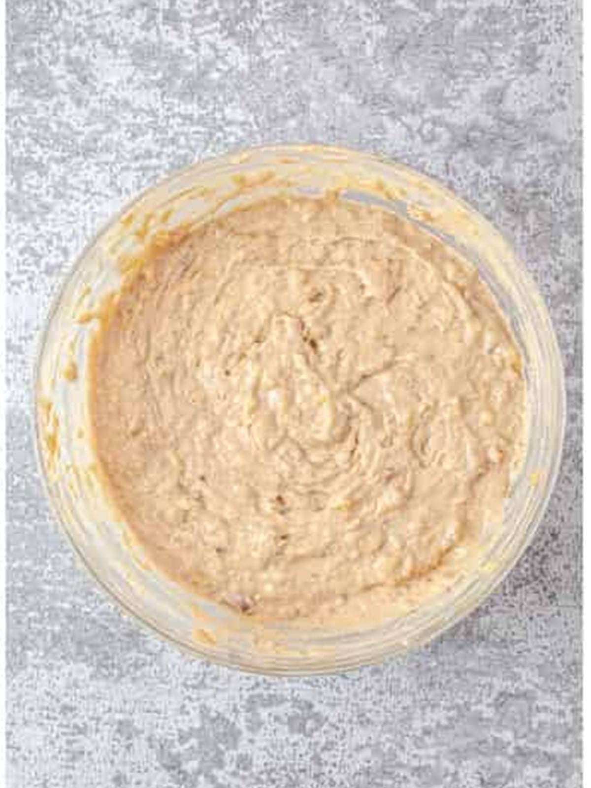 Finished banana nut bread batter with the dry ingredients and pecans folded in.