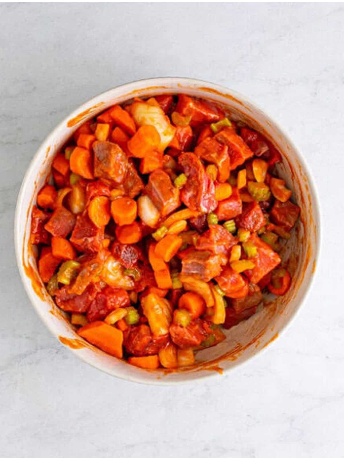 The beef and vegetables stirred together and coated in tomato soup for beef stew recipe.
