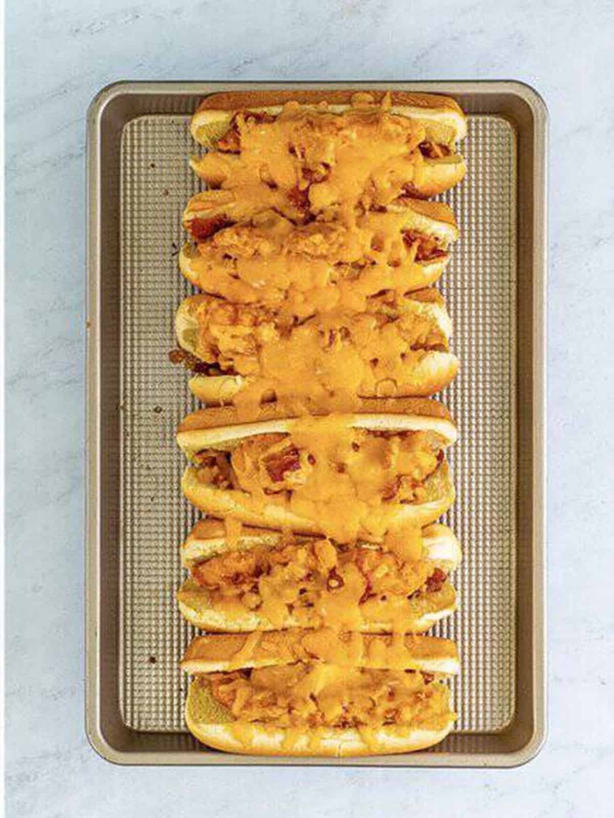 Baked bird dog sandwiches with melted cheddar cheese fresh from the oven.