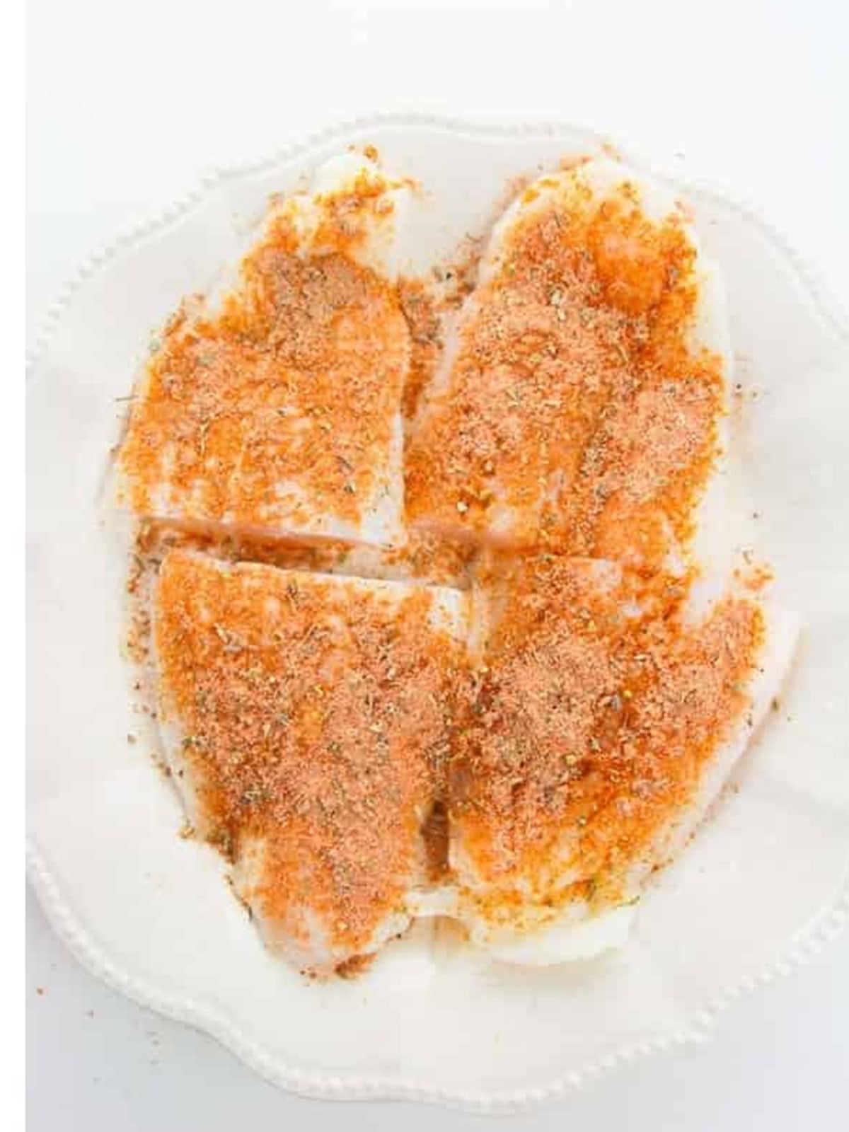 Catfish filets rubbed all over with cajun and blackening seasoning.