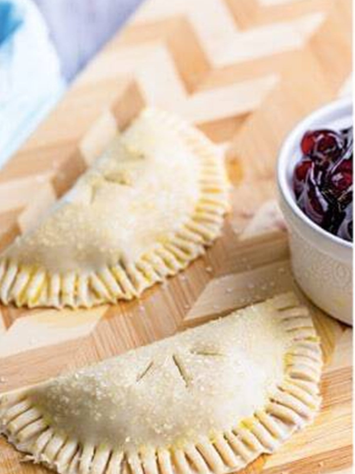 Steam slits cut into the tops of the hand pies.