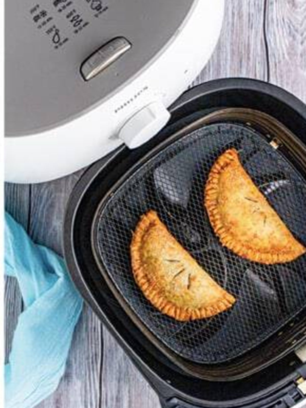 Golden brown blueberry hand pies fresh from the air fryer.