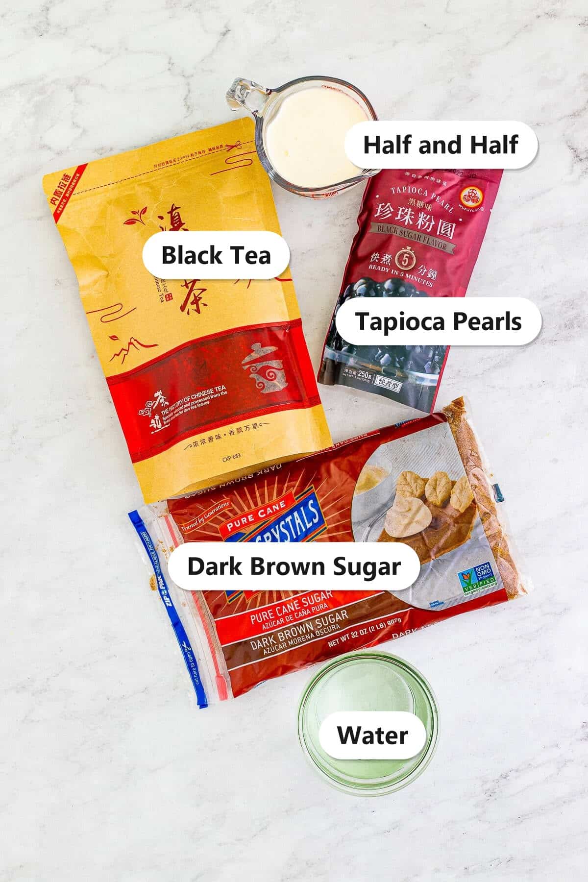 Labeled boba tea ingredients including black tea, tapioca pearls, dark brown sugar, and half and half