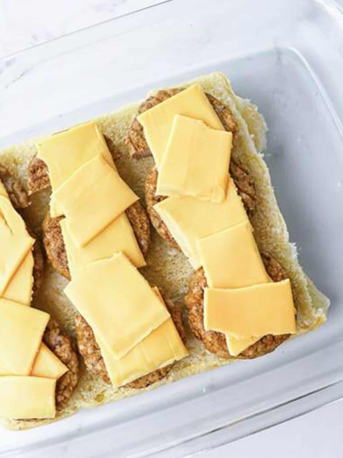 American cheese slices layered over the sausage patties.