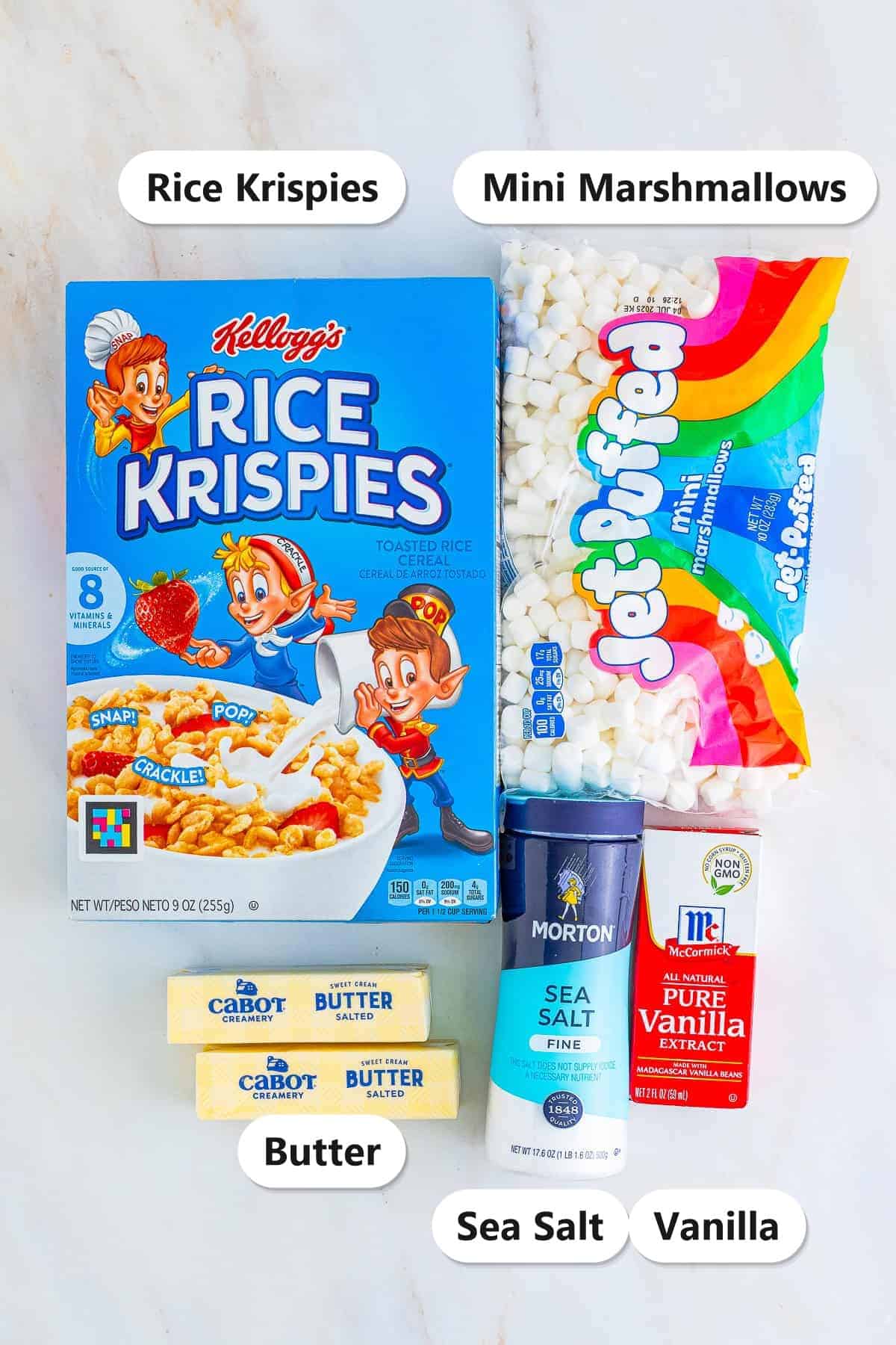 Labeled ingredients for brown butter rice krispie treats including Rice Krispies cereal, mini marshmallows, salted butter, sea salt, and vanilla extract.