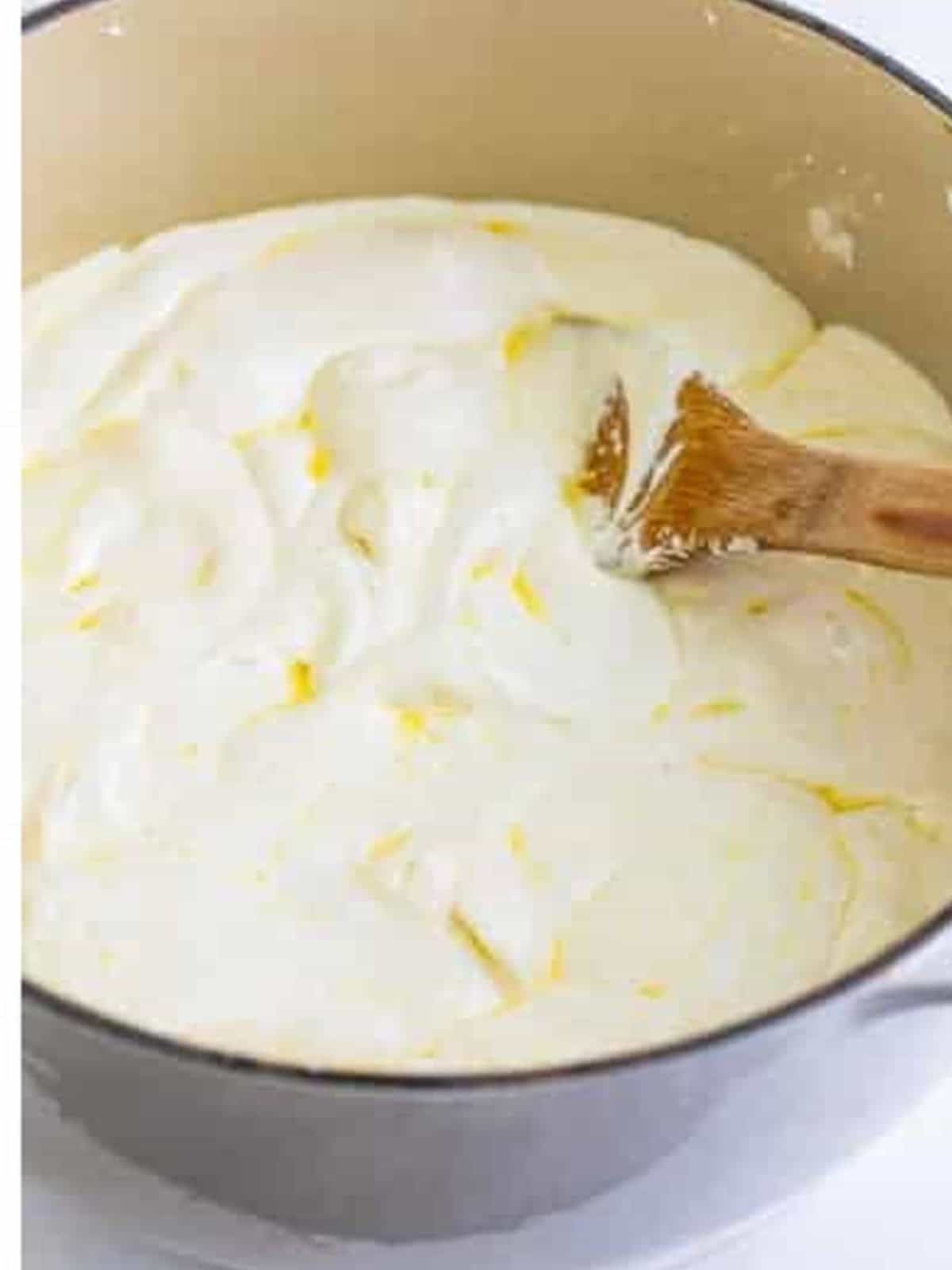 Marshmallows melted into a smooth glossy mixture for brown butter rice krispie treats.