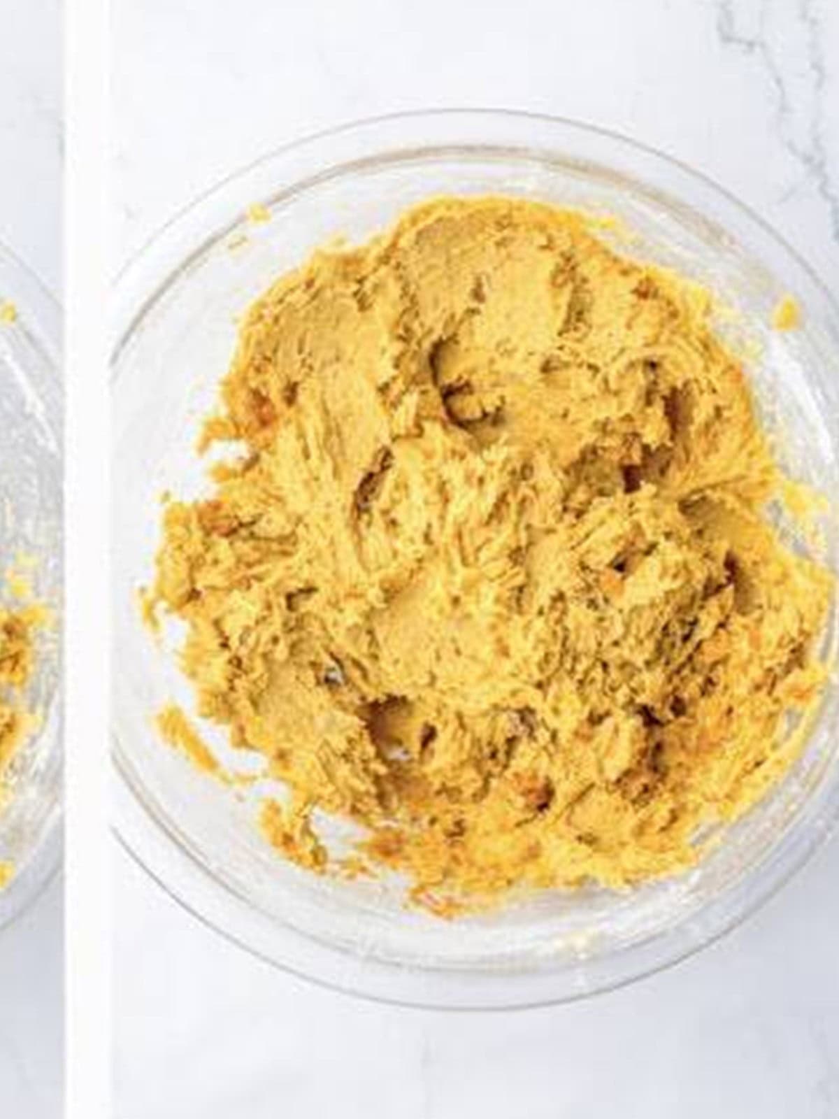 Chopped Butterfingers stirred into the cookie dough.