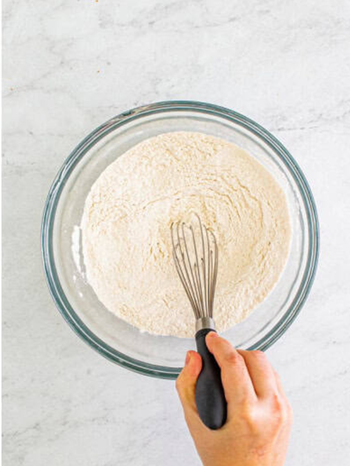 Whisking the dry ingredients together for Buttermilk Pancakes.