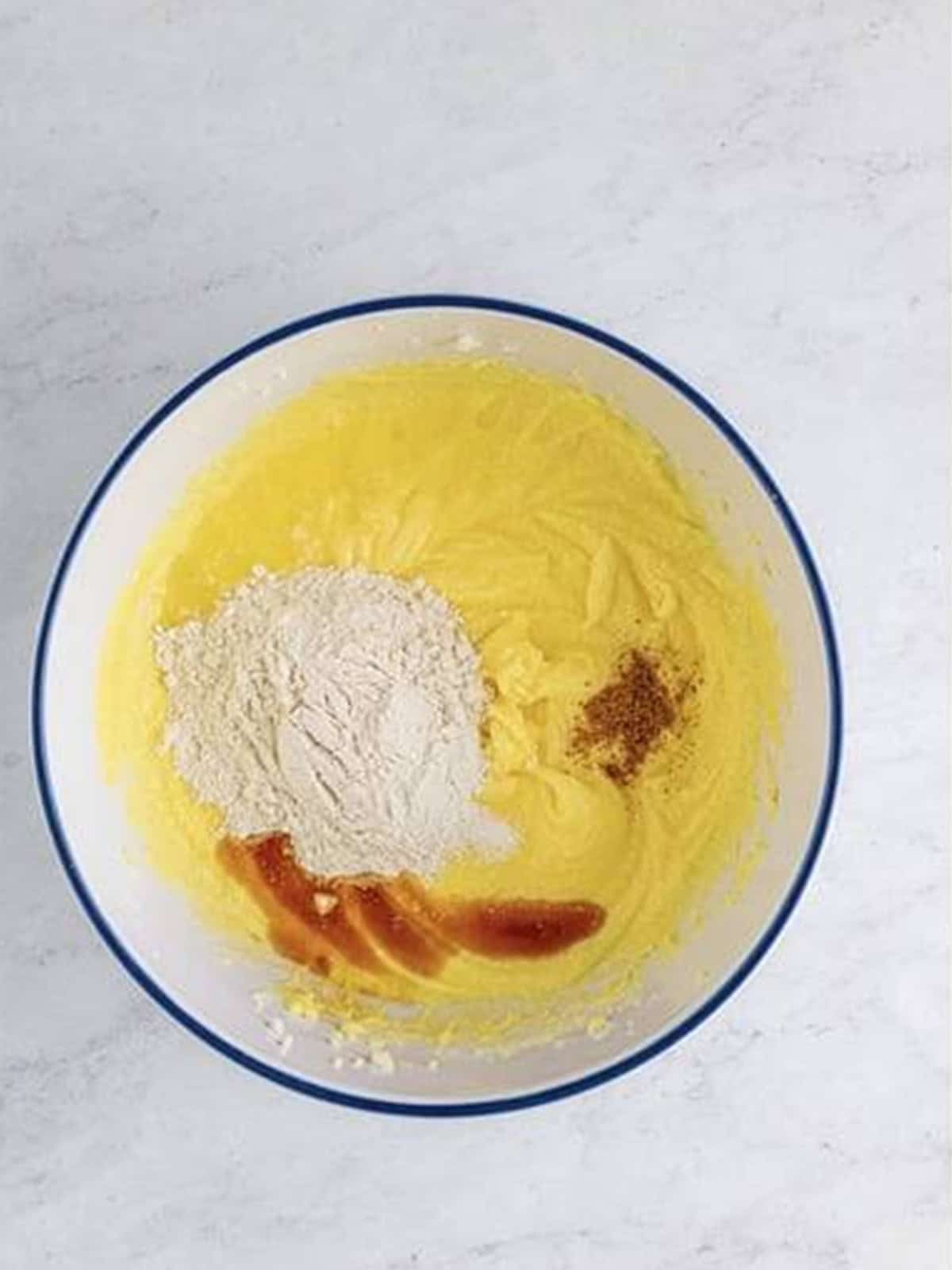 Flour, lemon juice, vanilla, salt, and nutmeg added to the Buttermilk Pie batter.