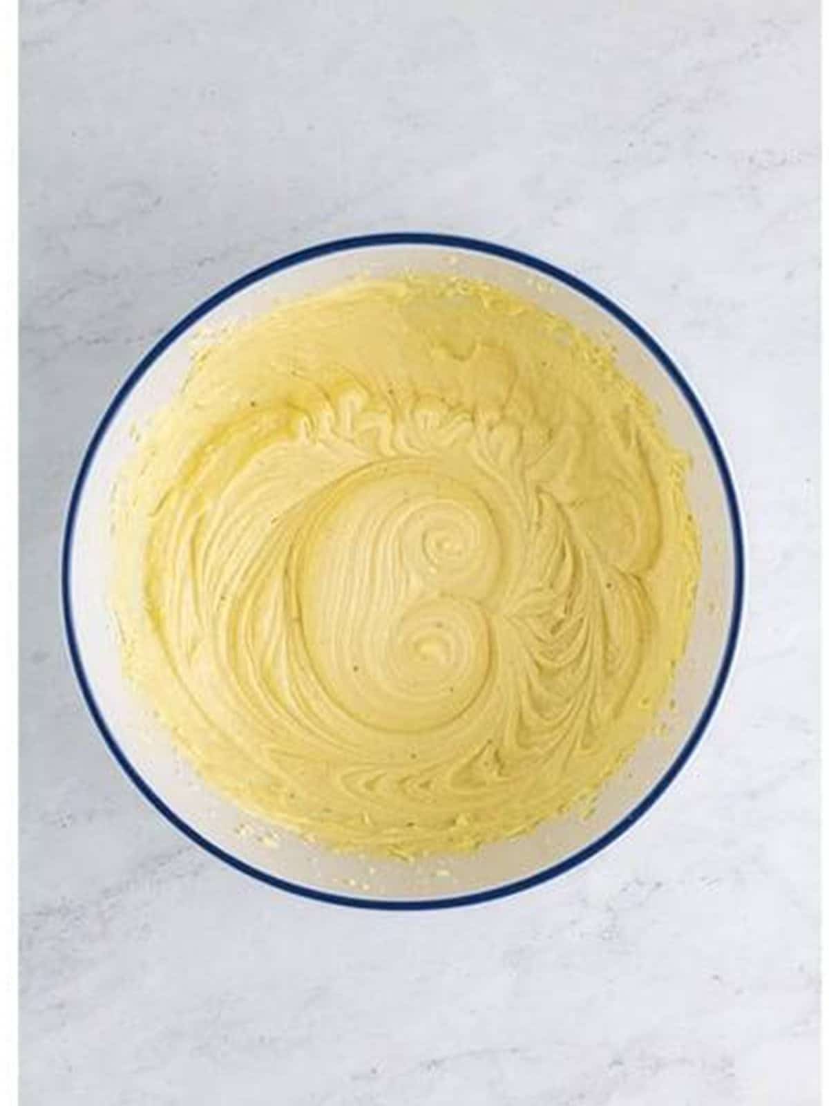 Smooth Buttermilk Pie batter in a glass bowl.