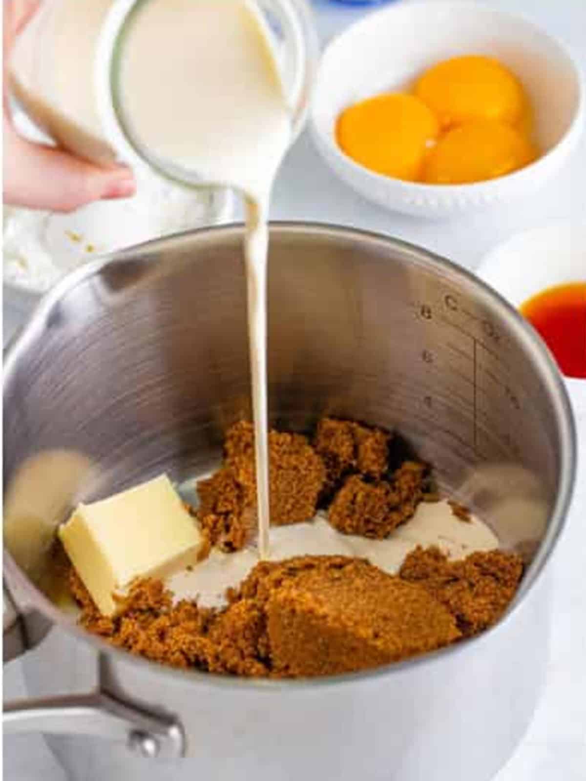 Melting brown sugar, heavy cream, and butter in a saucepan.