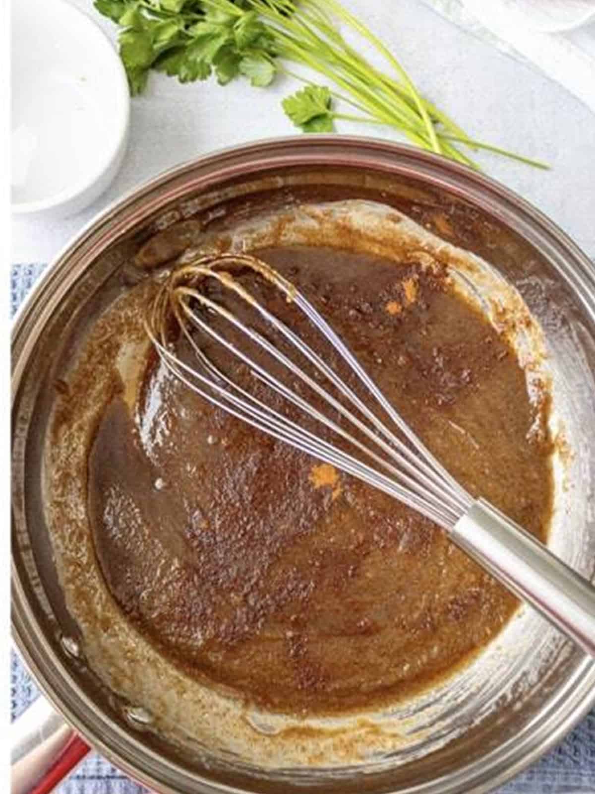 Brown sugar and cinnamon whisked into melted butter to make a glaze.