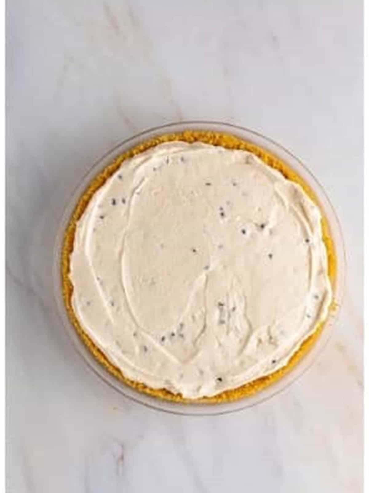 Cannoli pie filling spread into the crust.