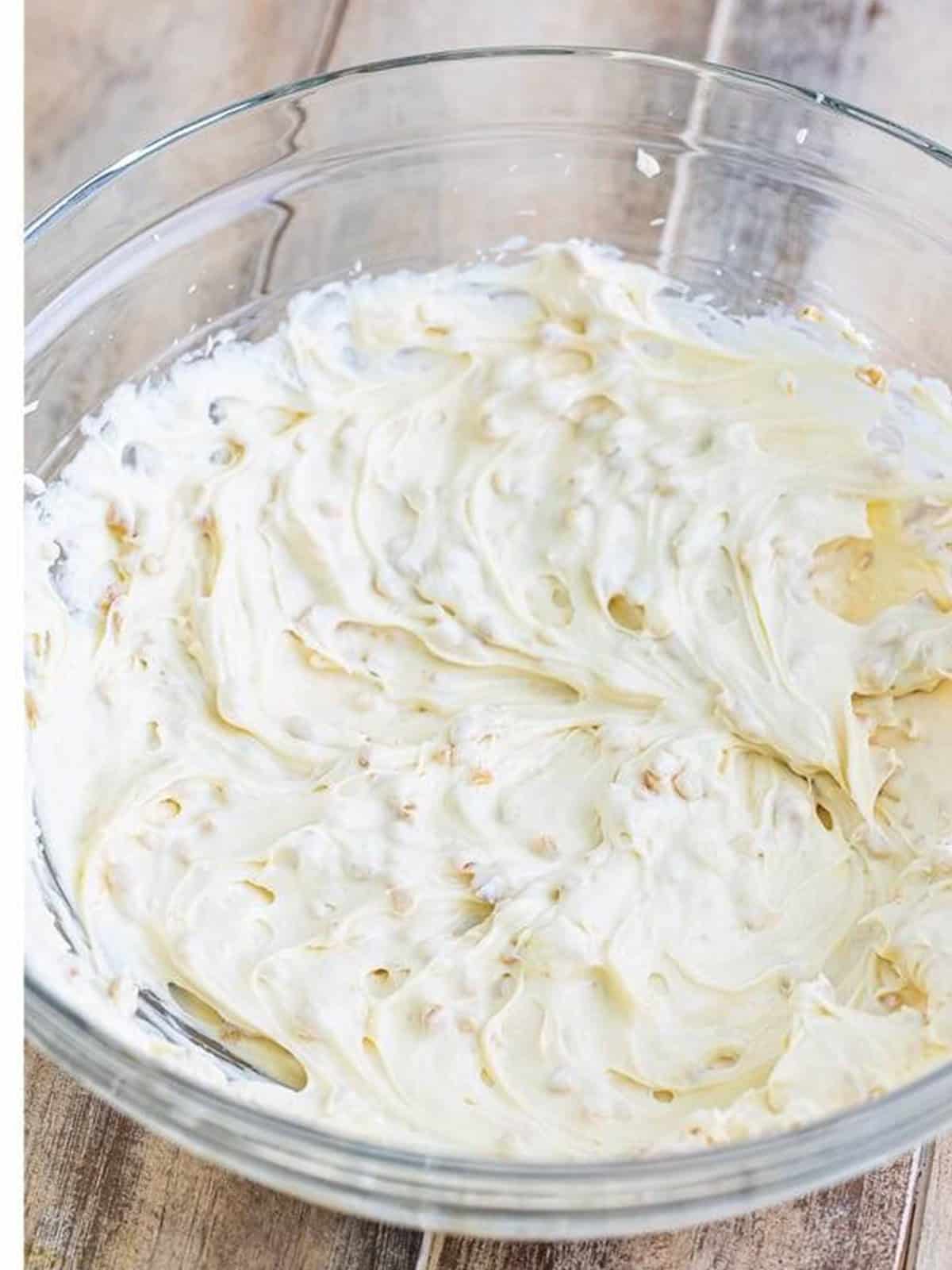 Smooth finished caramel apple dip in a serving bowl.