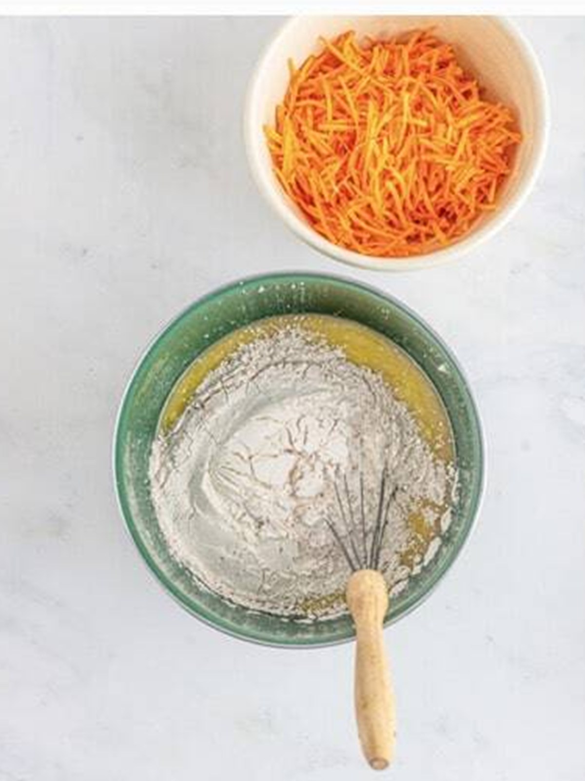 The flour mixture added to the wet ingredients for carrot bundt cake.