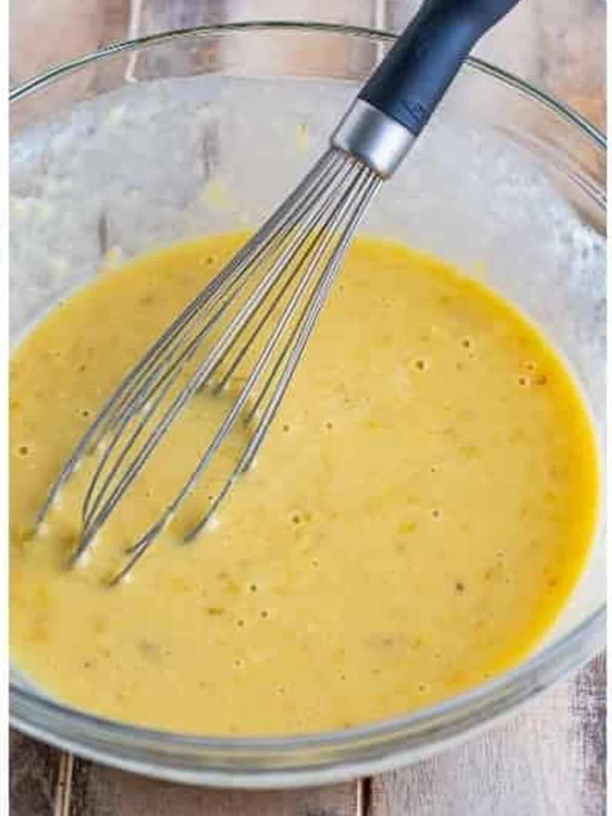 The whisked banana fritter wet batter.