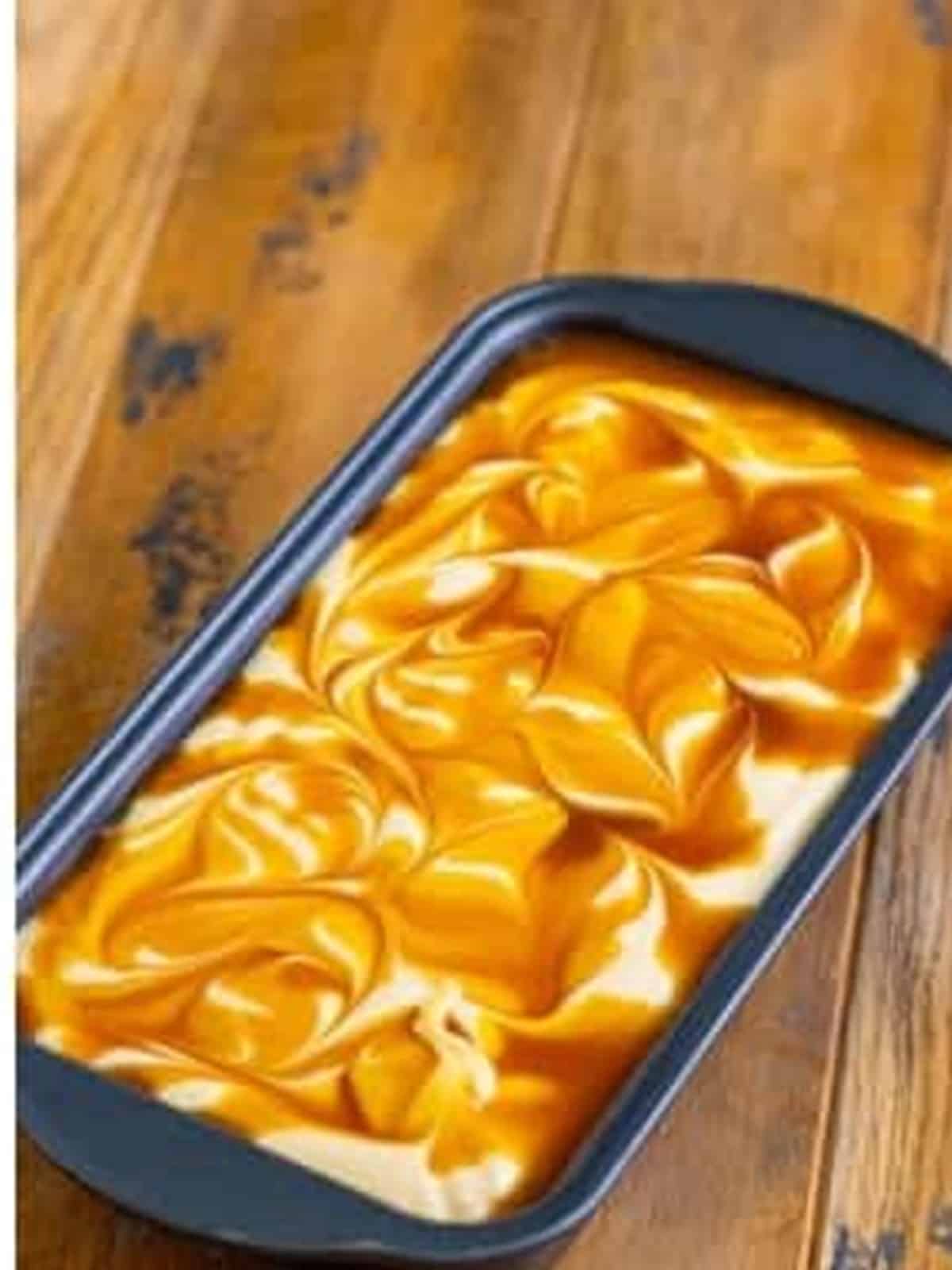 The butterscotch ice cream swirled with figure-8s before freezing.