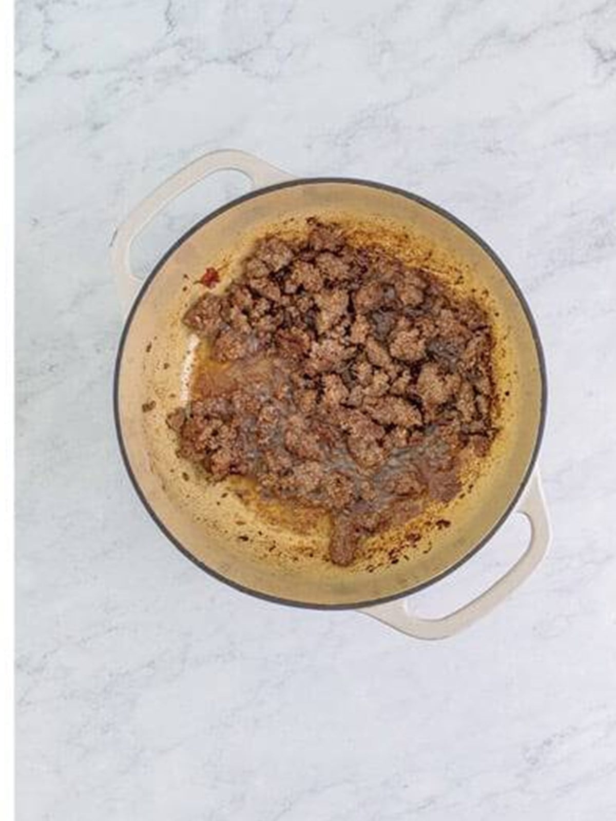 Ground beef browned in a dutch oven in the bacon drippings.