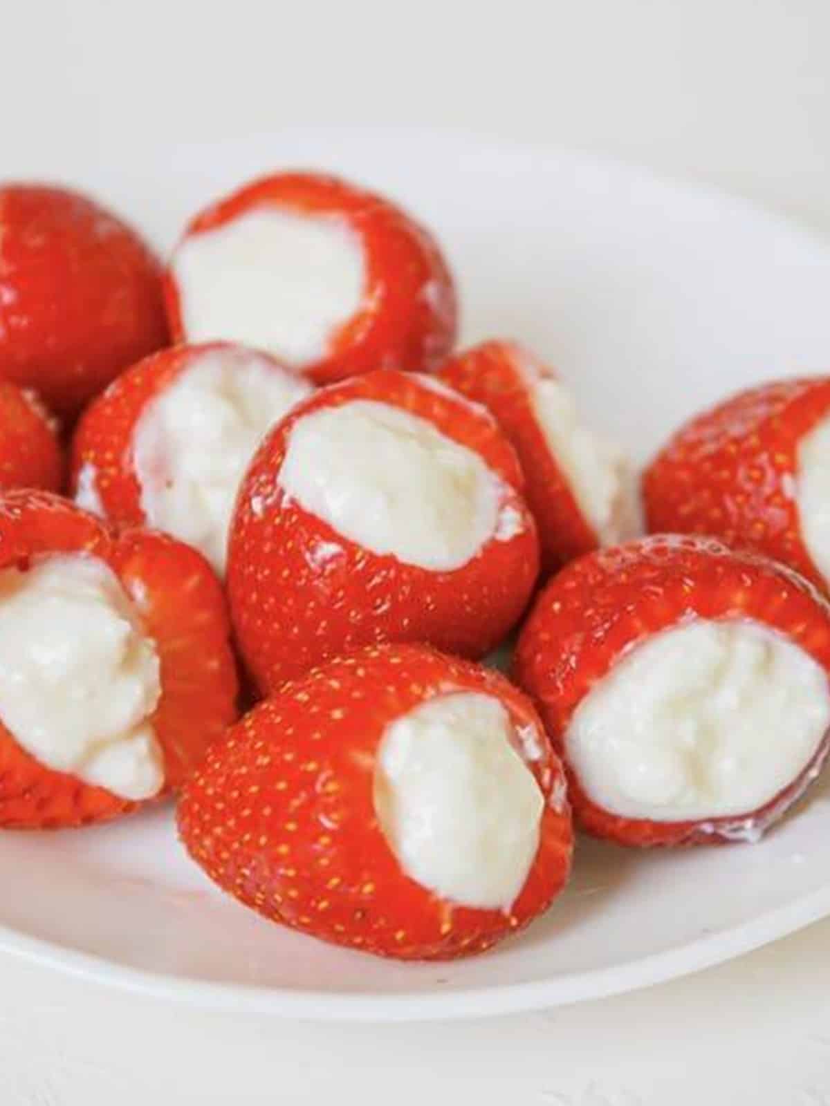 Strawberries stuffed with smooth cheesecake filling.