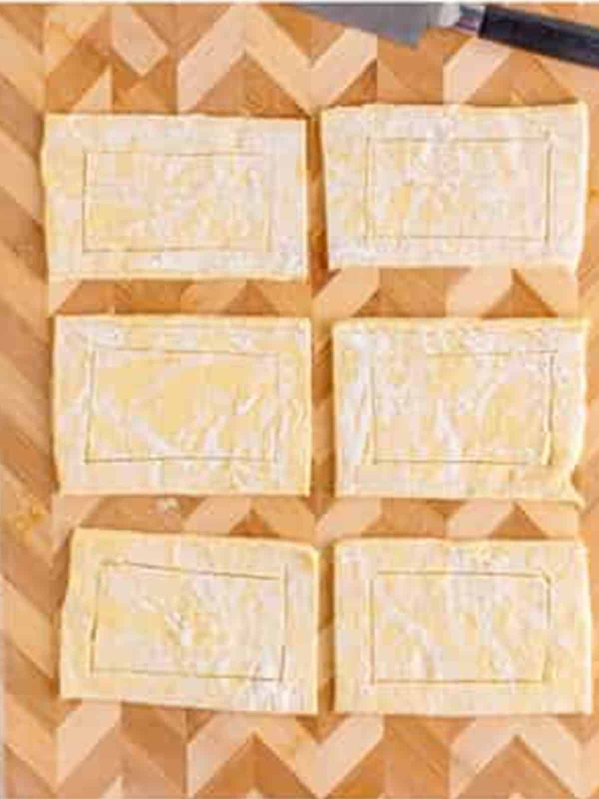 Borders scored around each puff pastry rectangle for Cherry Danish.