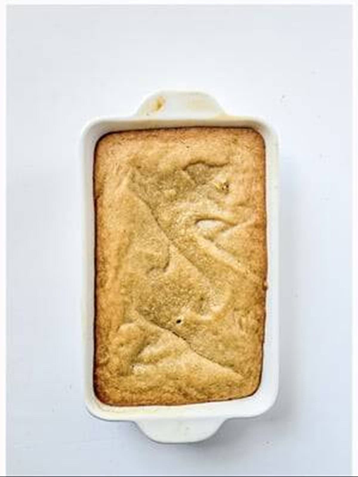 Golden baked blondie in a baking dish.