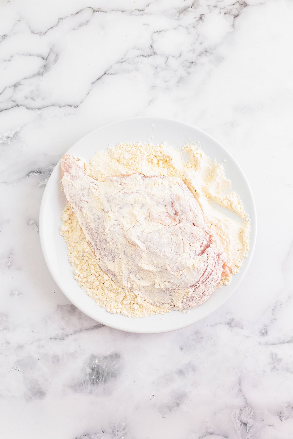 Seasoned panko breadcrumbs in a bowl for the crispy Cobb Salad chicken.