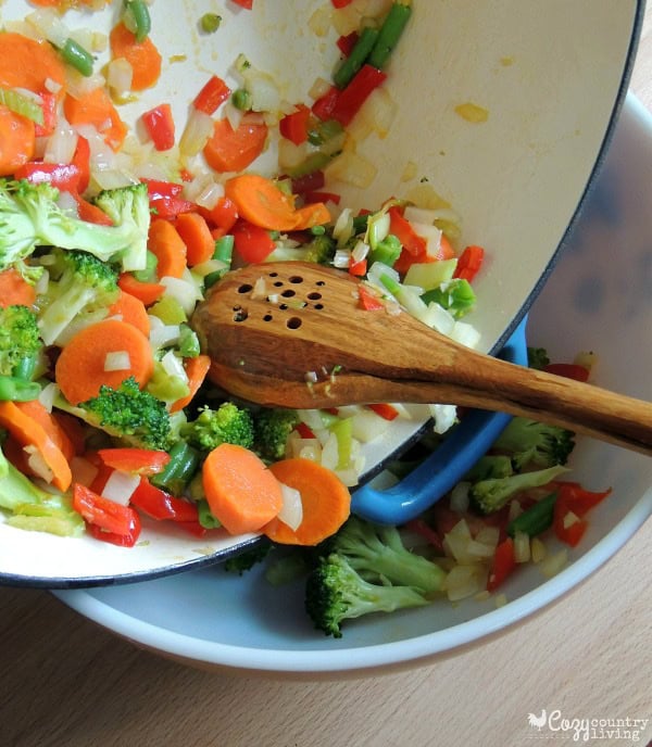 Sauteed broccoli, carrots, peppers, and green beans for cheesy chicken vegetable soup.