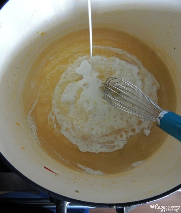 Butter and flour whisked into a roux in a pot.