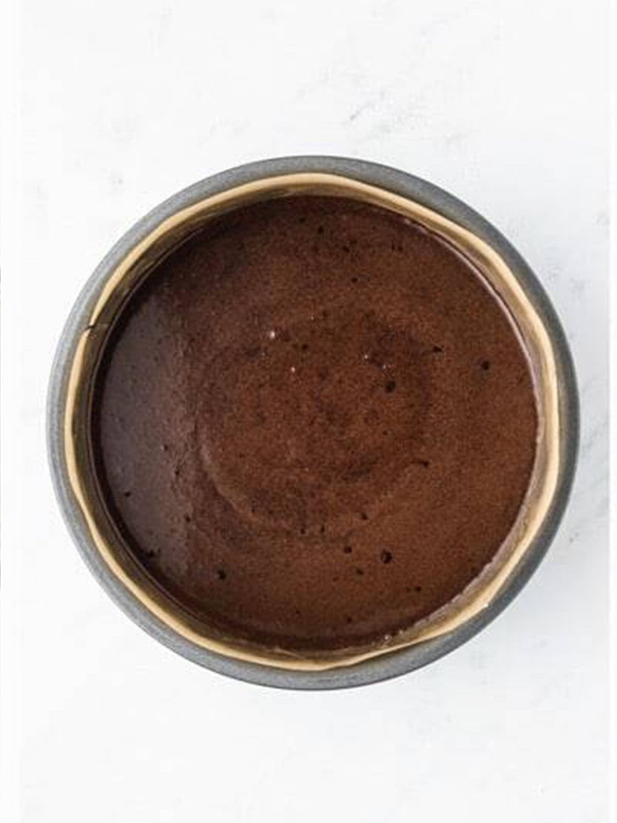 Baked chocolate cake layer for chocolate caramel cake.
